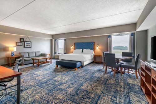 a hotel room with a bed and a desk at Bangor Aviator Hotel BW Premier Collection in Bangor