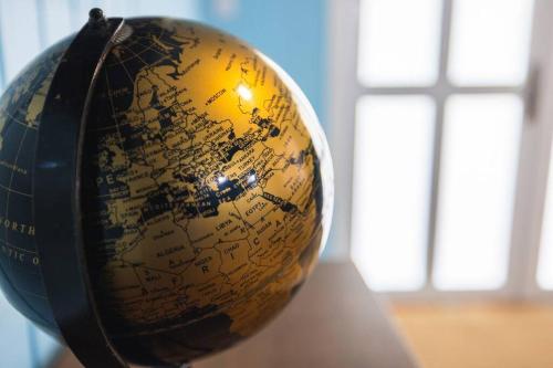a gold globe sitting on top of a table at Jobos Beach Apt #2 near food truck and beach in Isabela