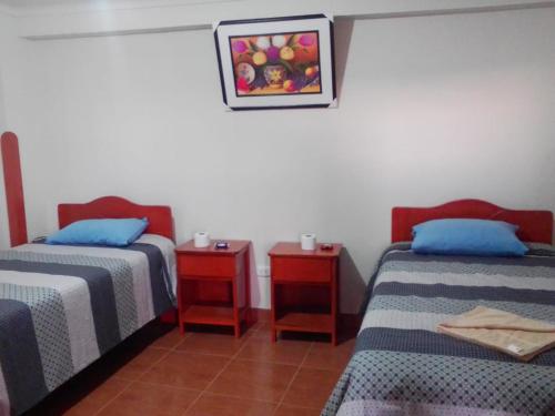 Ліжко або ліжка в номері Casa Tejedora