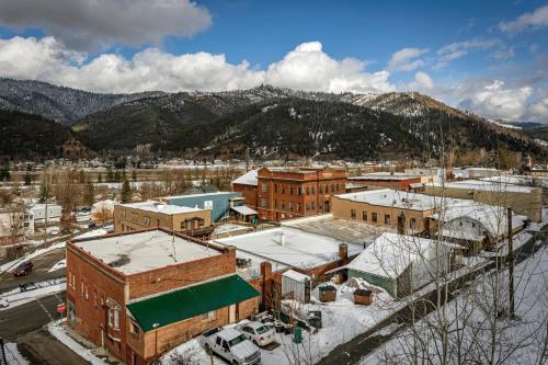 an aerial view of a town with snow covered buildings at Penthouse Studio w Mtn Sunrise Views & Near Silver Mtn in Kellogg