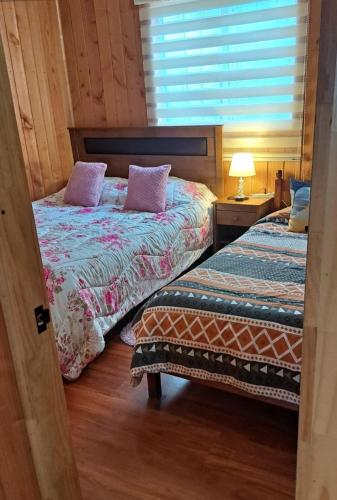 Postel nebo postele na pokoji v ubytování Cabaña jazmin