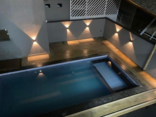 Fotografie z fotogalerie ubytování Casa com Piscina em Boracéia Bertioga v destinaci Bertioga