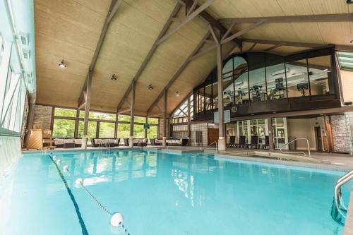 a large swimming pool in a large building at Cozy Getaway with Resort Perks in Edgar