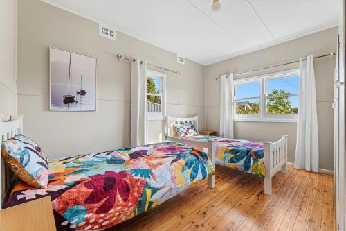 Ένα ή περισσότερα κρεβάτια σε δωμάτιο στο 9 Bay Street, Narooma