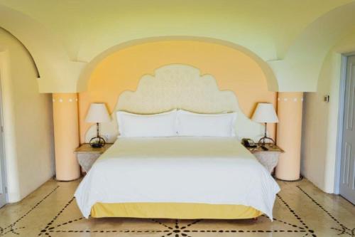 Quinta Real Huatulcoにあるベッド