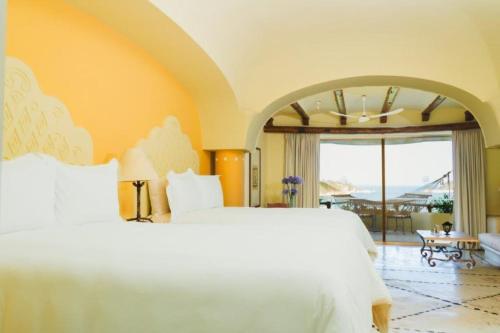 Quinta Real Huatulcoにあるベッド