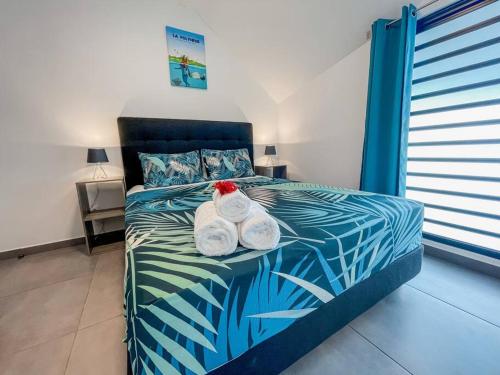 Ένα ή περισσότερα κρεβάτια σε δωμάτιο στο KOOKA NUI LODGE - Free Wifi & Parking