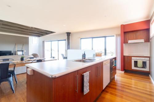 a kitchen with a sink and a counter top at Sunset Meadows in Sunset Strip