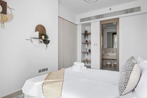 Postel nebo postele na pokoji v ubytování VayK - Brand New One Bedroom in JVC