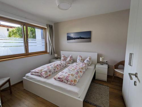 Postel nebo postele na pokoji v ubytování Ferienwohnung Bergzauber