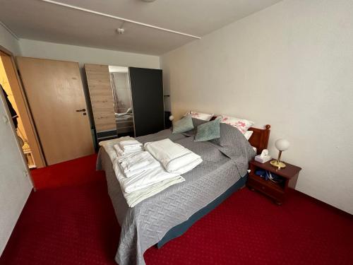 En eller flere senge i et værelse på Kaiserburg Apartment