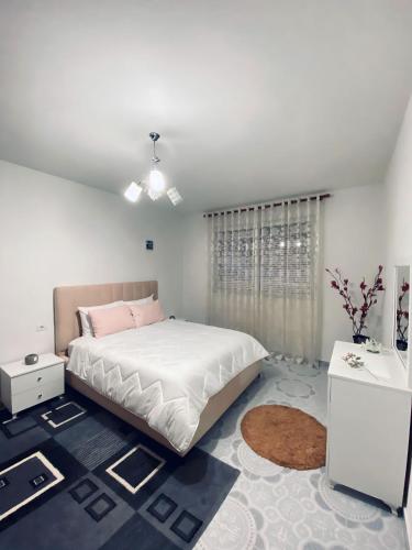 Postel nebo postele na pokoji v ubytování Apartment Luli