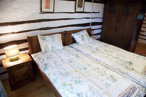 Łóżko lub łóżka w pokoju w obiekcie Agroturystyka Dyrdówka