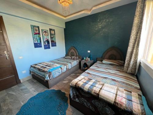 Postel nebo postele na pokoji v ubytování Chalet in Mountain View Sokhna 1 luxurious with garden 3 bedrooms with AC, 2 bathrooms, heated pool, families only