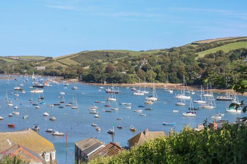 a harbor filled with lots of boats in the water at 18 Robinsons Row in Salcombe
