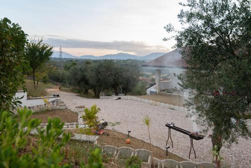 a view of a gravel yard with a building and a building at Green Residence Villa Assunta in Moscufo