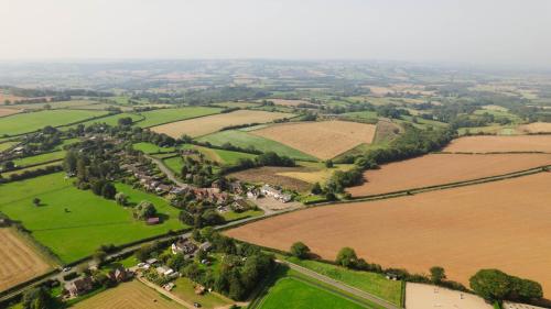 an aerial view of a village in a field at Hanley House in Tenbury
