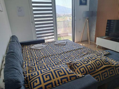 Postel nebo postele na pokoji v ubytování Apartment Moki