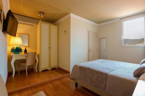 Cama o camas de una habitación en Palazzo Pischedda