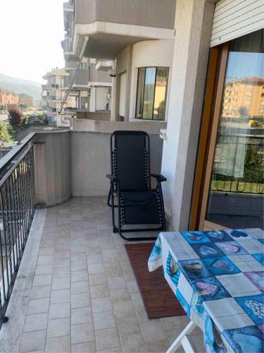 a chair sitting on the balcony of a building at IL SENSO DI LIBERTA' in Rieti