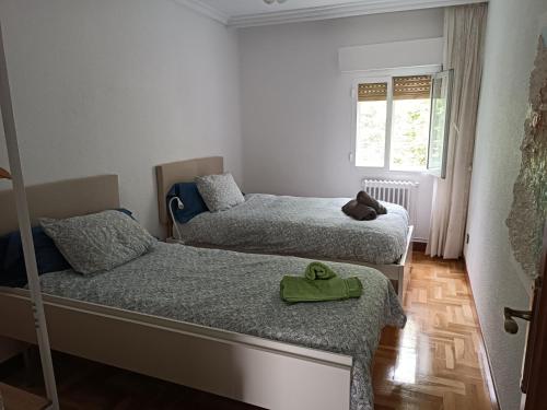 Posteľ alebo postele v izbe v ubytovaní Apartamento Pamplona a 10 minutos del centro