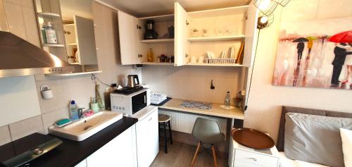 Kuchyň nebo kuchyňský kout v ubytování Aparthotel - SAVAS 1 - Mini Studio & Parking