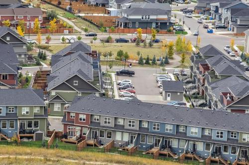 an aerial view of a residential neighborhood with houses at GlobalStay Cranbrook Townhome Suites in Calgary