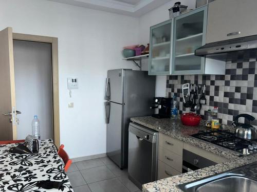 Virtuvė arba virtuvėlė apgyvendinimo įstaigoje Costa Mar , avenue Miramar