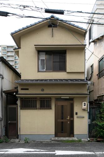 a house with a garage in front of it at GREEN in Okayama