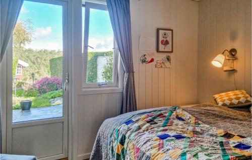 Postel nebo postele na pokoji v ubytování Nice Home In Kristiansand With Kitchen