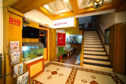 El vestíbulo o zona de recepción de Hotel Vrundavan Residency