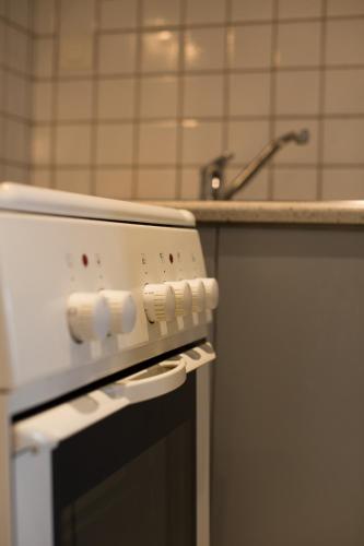 Una cocina o zona de cocina en Delice Hotel - Family Apartments