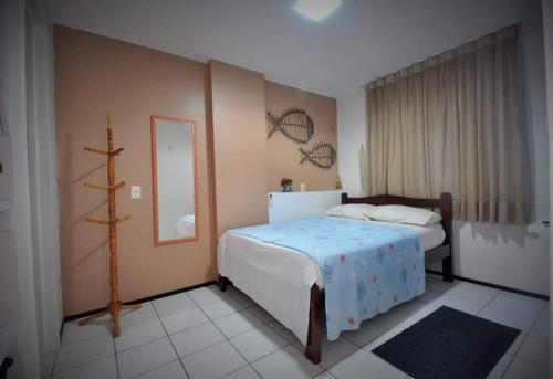 מיטה או מיטות בחדר ב-Apartamento na Praia de Iracema, Meireles.