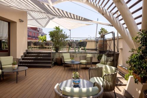 Posezení v ubytování UNA Hotels Napoli