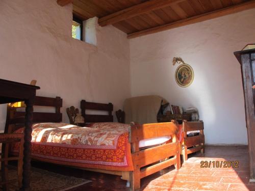מיטה או מיטות בחדר ב-Meiro di Choco