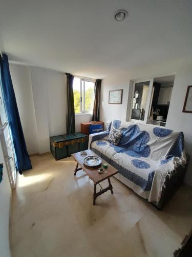 A bed or beds in a room at playa mar 2