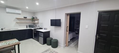 Η κουζίνα ή μικρή κουζίνα στο Uitsig Boutique Hotel