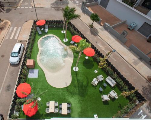 Κήπος έξω από το Sercotel Plana Suites