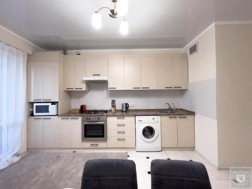 Dapur atau dapur kecil di RentHouse Apartments Cozy Stay