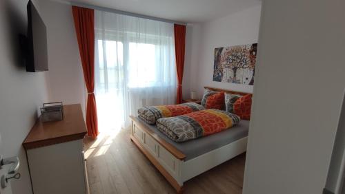 Ένα ή περισσότερα κρεβάτια σε δωμάτιο στο Apartment Joerg Sibiu