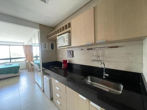 Køkken eller tekøkken på Flat Mar C Branco - beira-mar