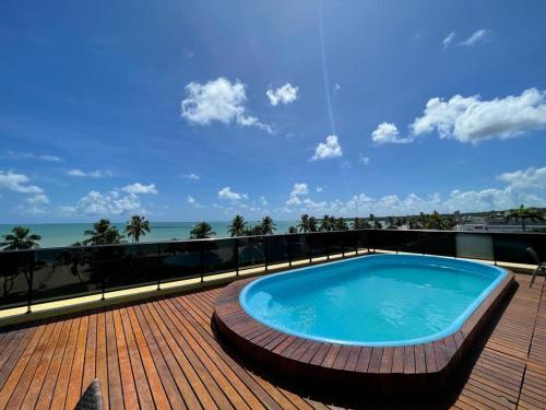 Swimmingpoolen hos eller tæt på Flat Mar C Branco - beira-mar