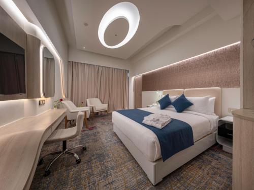 Postel nebo postele na pokoji v ubytování Crowne Plaza Alexandria Mirage by IHG