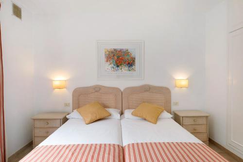 Un pat sau paturi într-o cameră la Villa Verde Superior B
