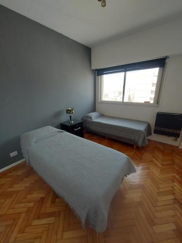 Una cama o camas en una habitación de Caballito Apartment