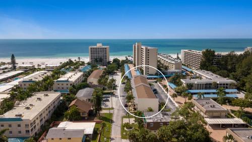 an aerial view of a city with buildings and the beach at Enjoy the Siesta Key Beach Life to the fullest! Beach AND Pool Access in Siesta Key