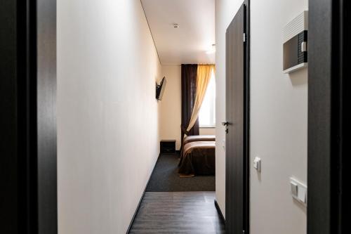 Postel nebo postele na pokoji v ubytování Zhytomyr palace mimino