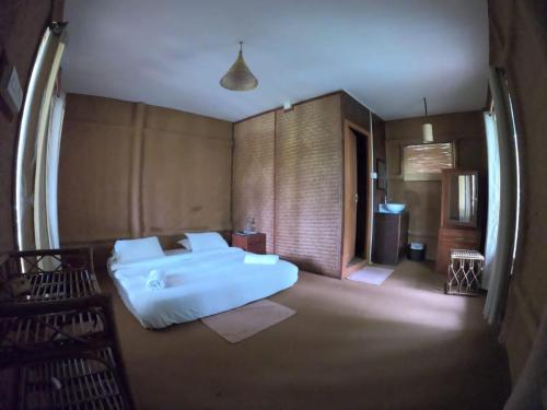 Thennal Junglecampにあるベッド