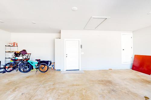 an empty room with bikes parked in it at Life is Good on 18th Street in Bentonville