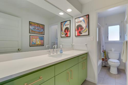 a bathroom with a sink and a toilet at Modern Austin Home with Yard about 1 Mi from ACL! in Austin